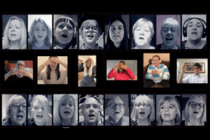 A grid of faces singing in an online rehearsal, with some singers signing the words